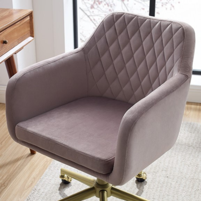 Elegant modern office chair featuring gold wheels and quilted fabric, perfect for a stylish work environment