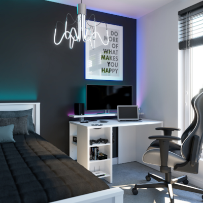 a room with a bed and a computer