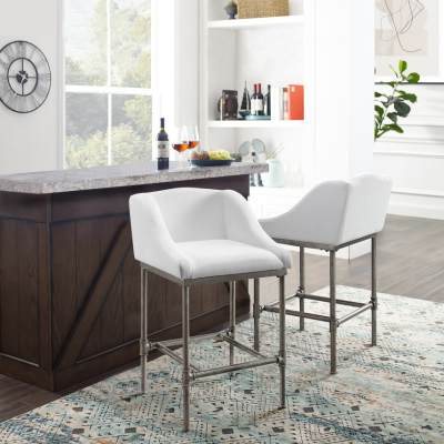 a bar with two chairs in a room