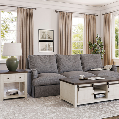 a living room with a couch and coffee table