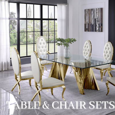 a dining table with chairs in a room