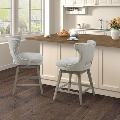 a kitchen with white cabinets and white countertops