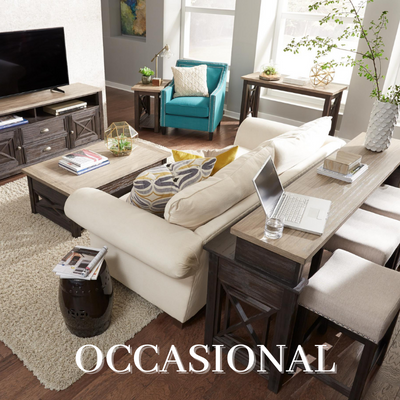 a living room with a couch and coffee tables