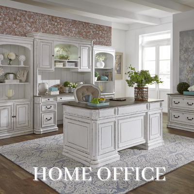 a room with white furniture and a large desk