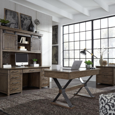 a room with a desk and a computer